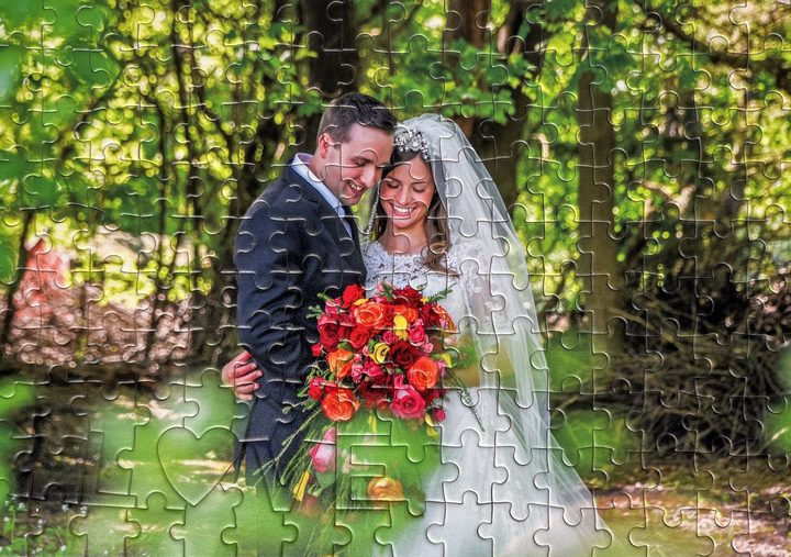 Finished 158-piece UArtist wedding photo puzzle with a heart LOVE design